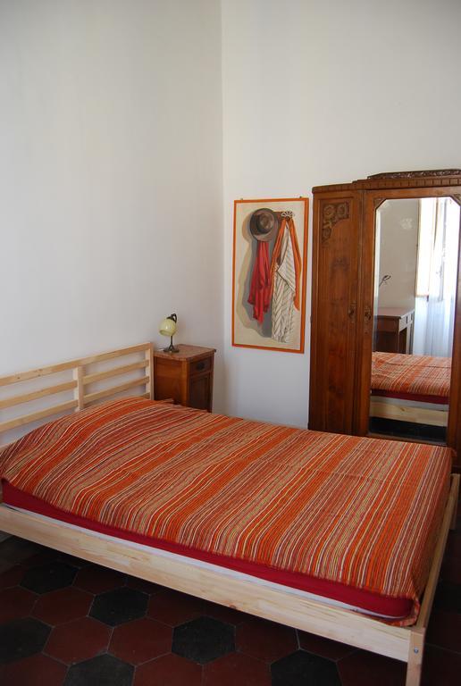 Su Al Celio - Colosseo Bed and Breakfast Roma Habitación foto